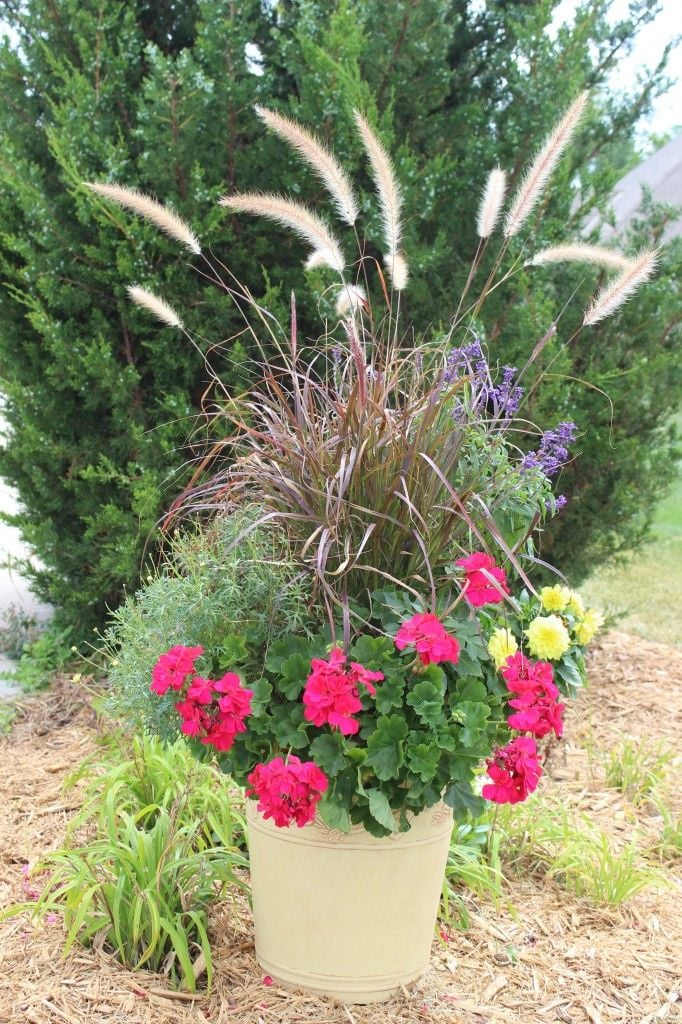 Planter closer to the end of the driveway.