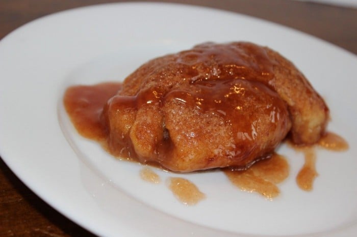 Drizzle a little of the caramel sauce from the pan onto your apple dumpling.