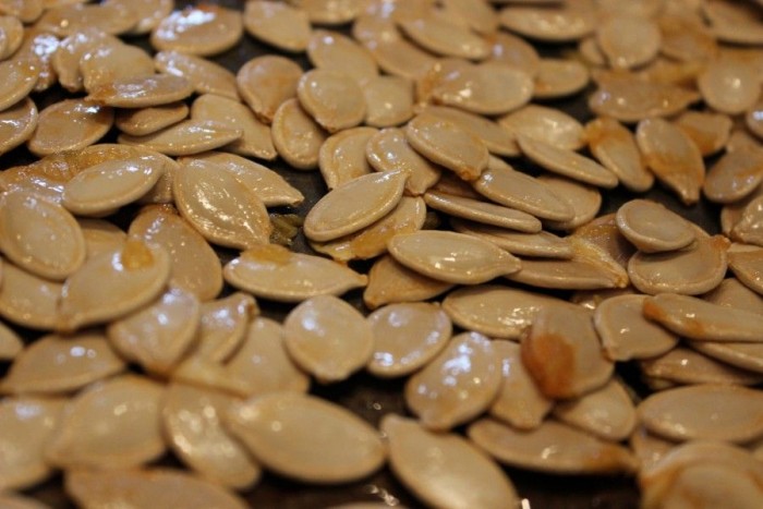 Pumpkin seeds with goop holds the salt.