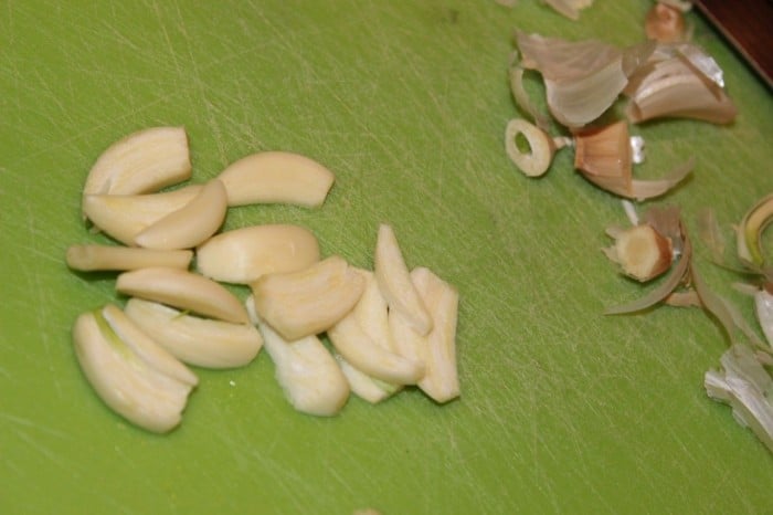 The peeled and slivered garlic.