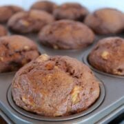 banana chocolate muffins in a muffin tin