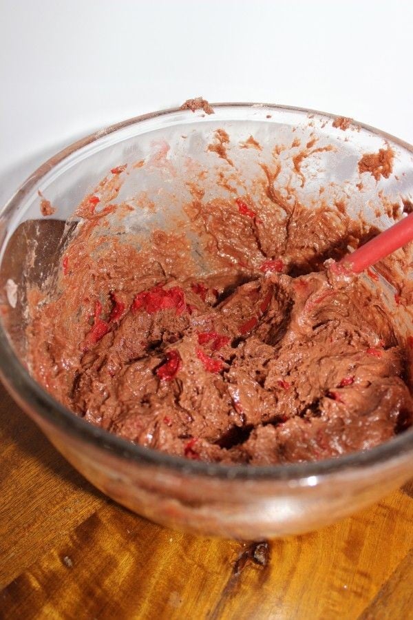 chocolate cherry muffin dough being mixed