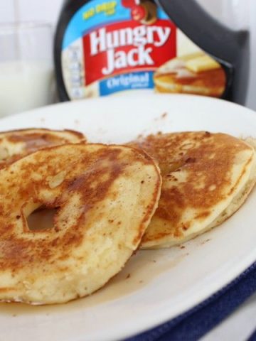 Apple pancakes. Slices of apple, covered in pancake batter - delicious with a little syrup!