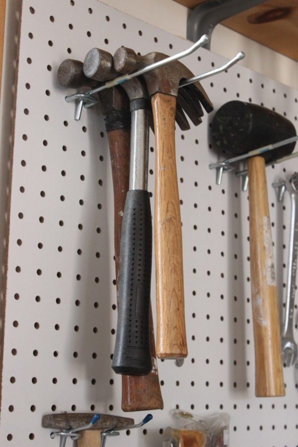 hammers on the tool pegboard