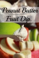Peanut butter fruit dip on an apple slice.