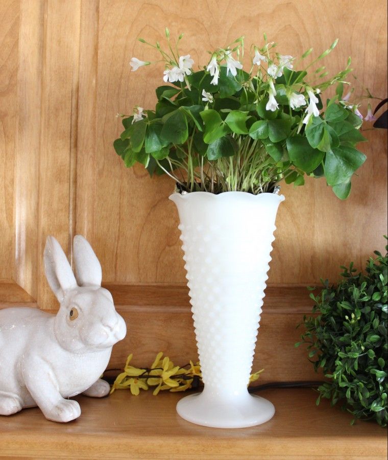 spring mantle. An easter bunny and oxalis plant in my murcury glass vase.