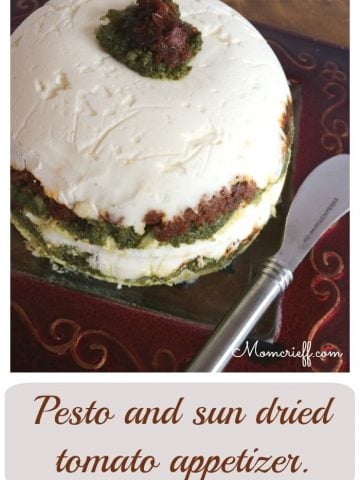 Pesto and sun dried tomato appetizer. It looks amazing and can easily be prepared days ahead of time! Love the red and green.