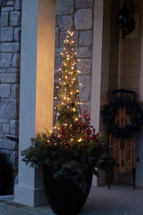 DIY Christmas Planter with pretty white lights.