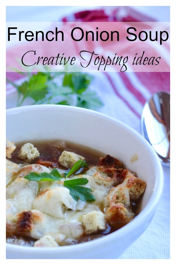 A bowl of French onion soup with croutons and melted cheese