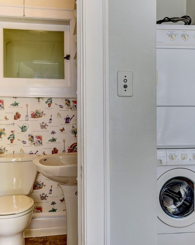 The powder room and laundry room prior to the flood.