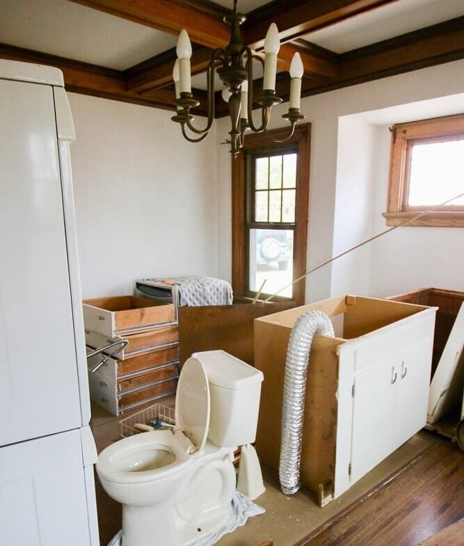 The dining room with the contents of the kitchen, powder room and laundry room.