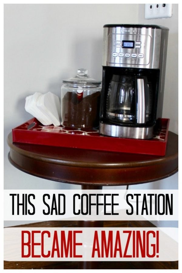 A small table with a coffee maker and coffee making supplies on top