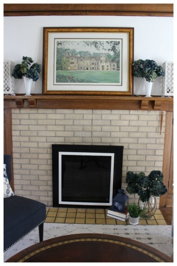 A view of the fireplace with the decorated mantle.