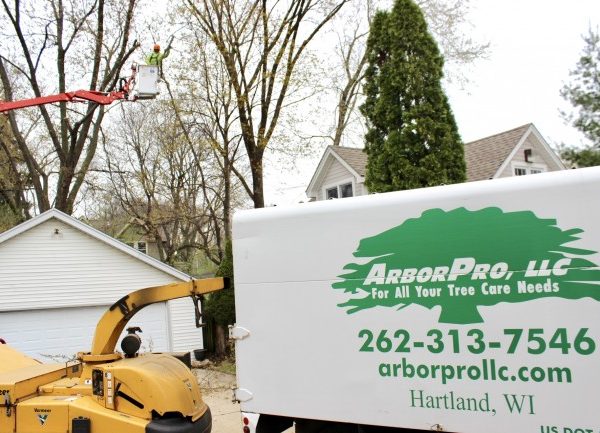 truck pulling a woodchipper. 