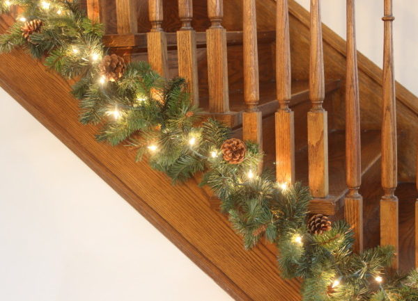 Easy and Inexpensive Christmas Stair Garland - Momcrieff