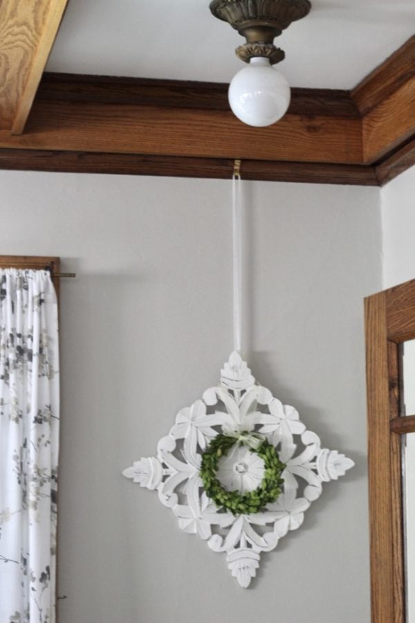 home decor hanging from picture rail