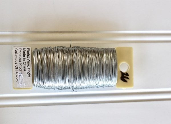 a spool of silver floral wire