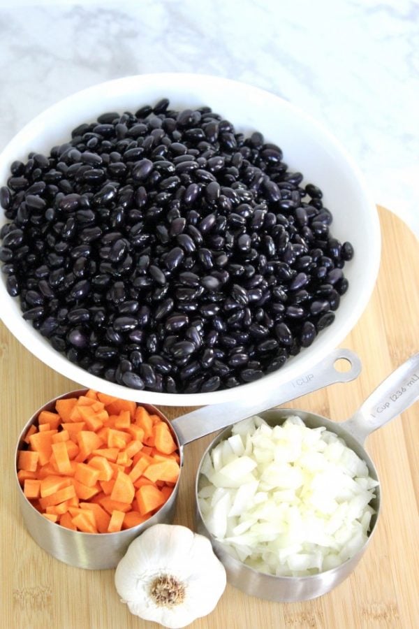 black beans, 1 cup chopped onions, 1 cup chopped carrots and a head of garlic cloves