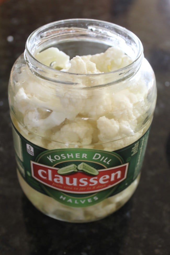 pickle jar full of pieces of raw cauliflower