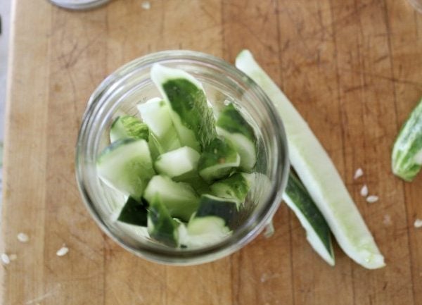 pickle spears filling a canning jar