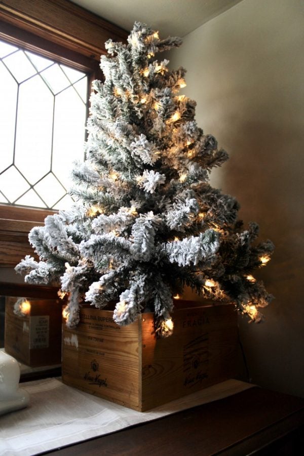 Flocked christmas tree in a wooden wine box