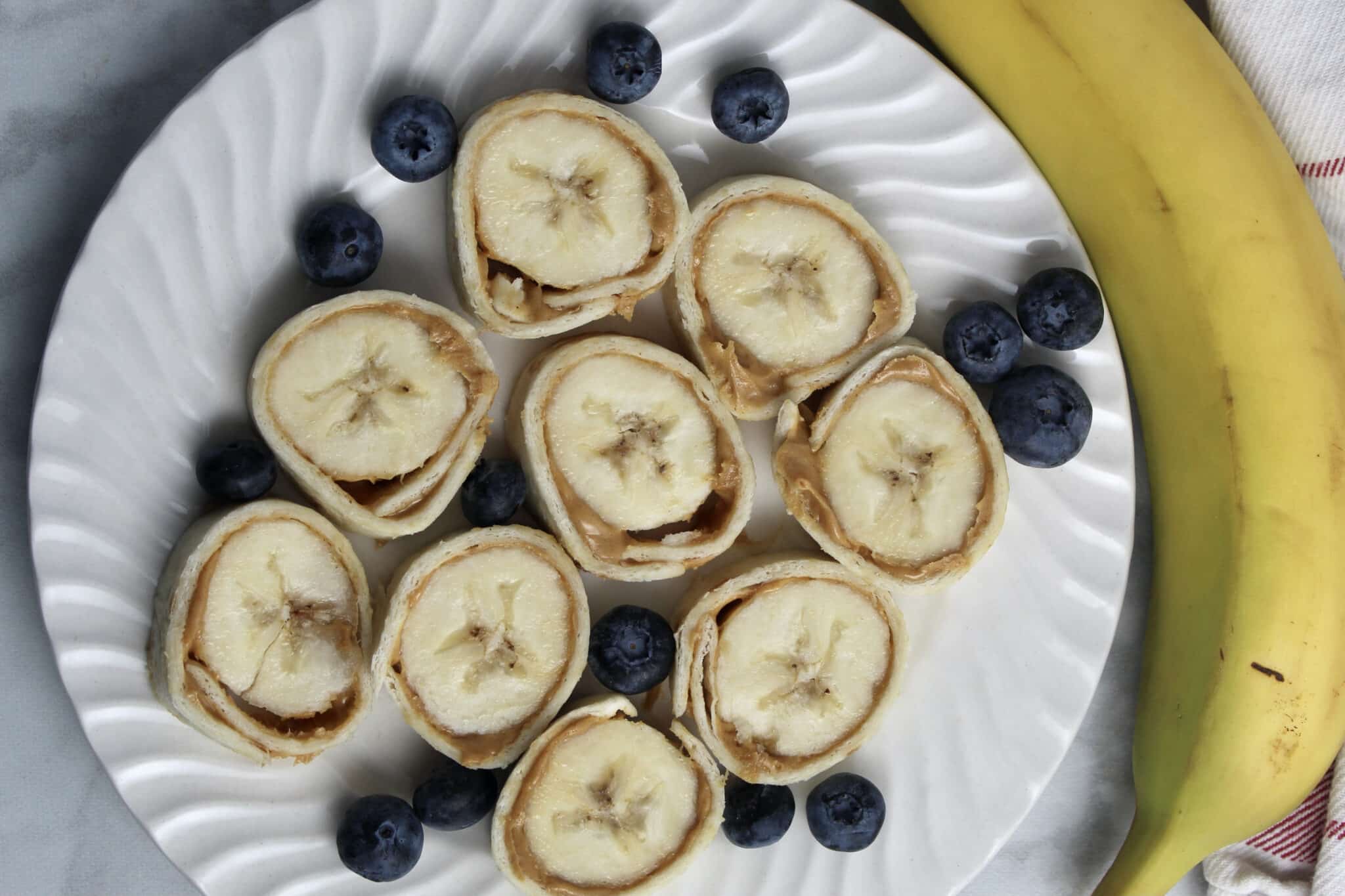 sliced peanut butter and tortilla rolls