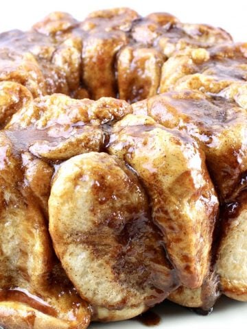 monkey bread with caramael sauce on a platter