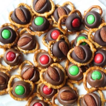 M&M's and almonds on hershey kisses melted onto pretzels