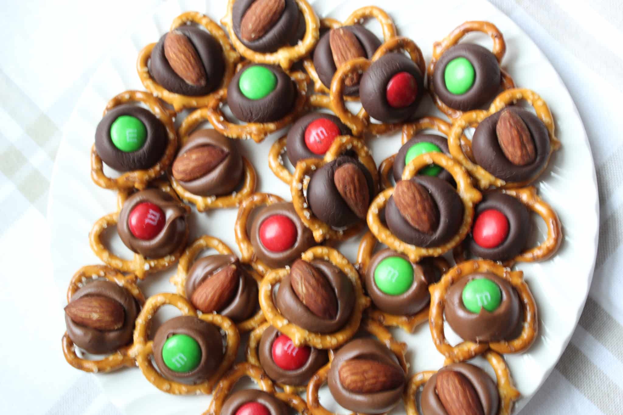 M&M's and almonds on hershey kisses melted onto pretzels
