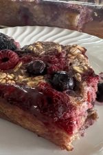 a serving of baked oatmeal with mixed berries