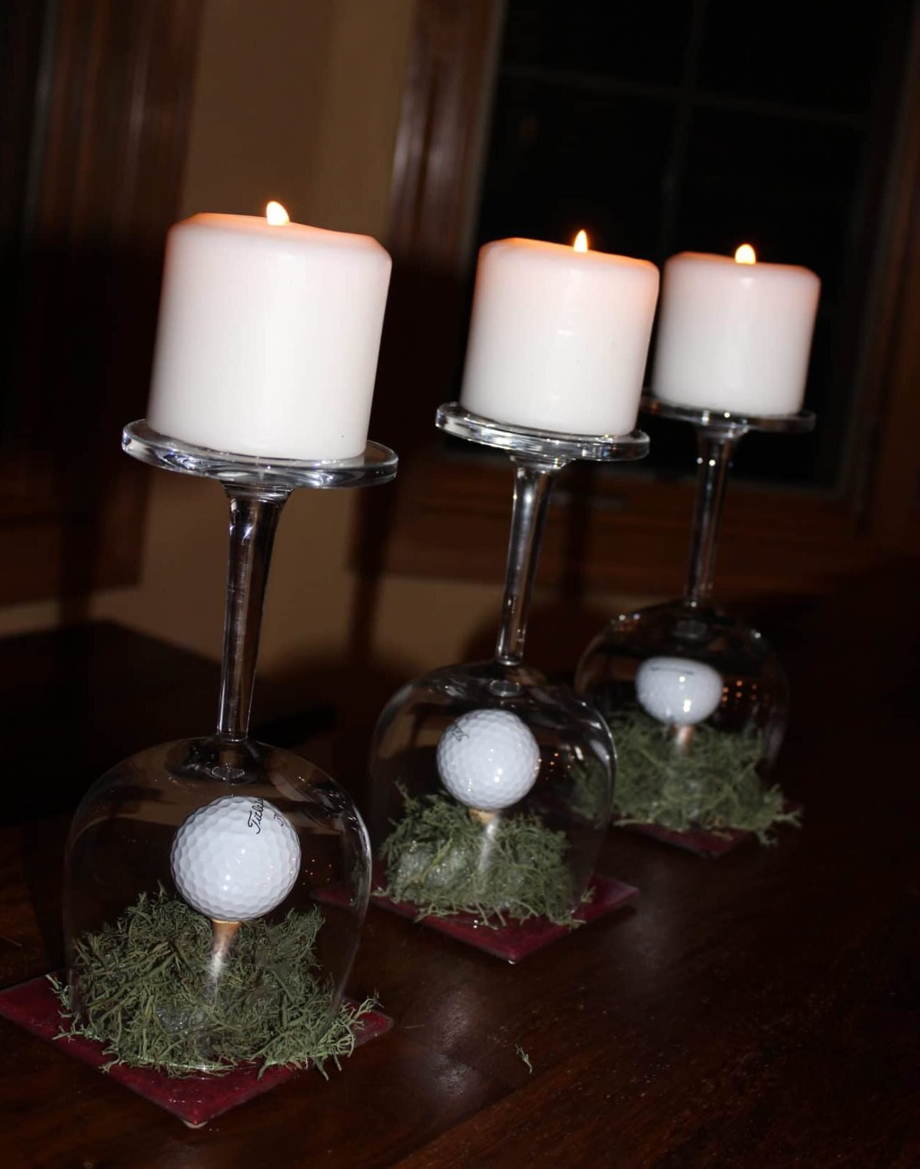 golf centerpiece with golfball, tee and candle