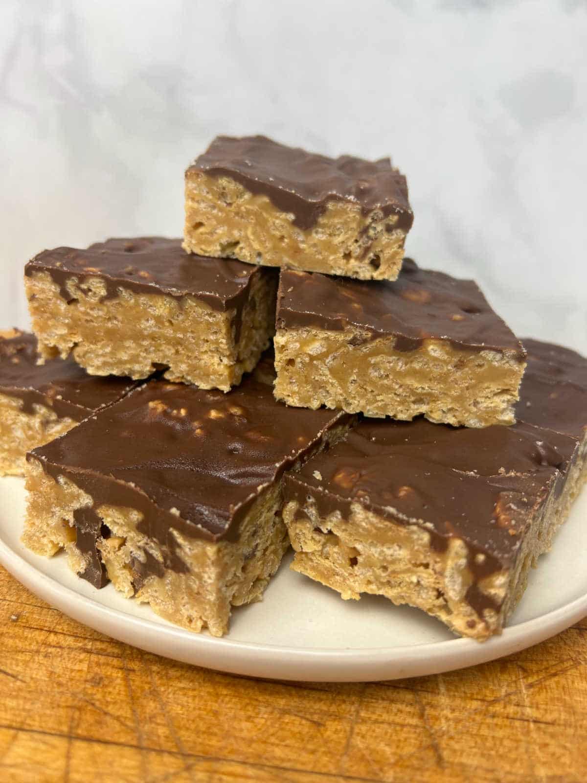 special k cereal bars stacked on a white plate