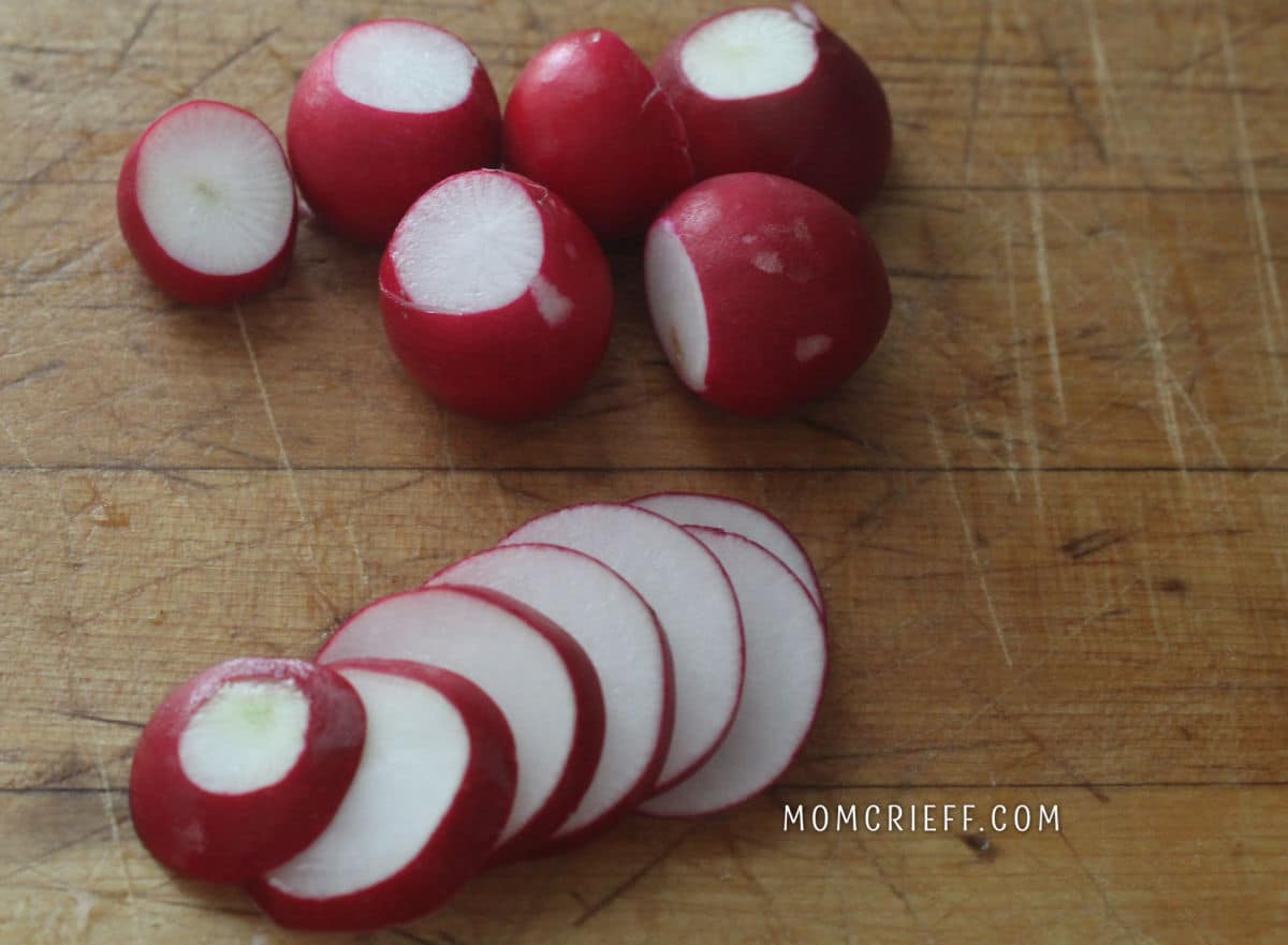 round radishes by a sliced radish