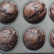 Chocolate muffins in a muffin tin.