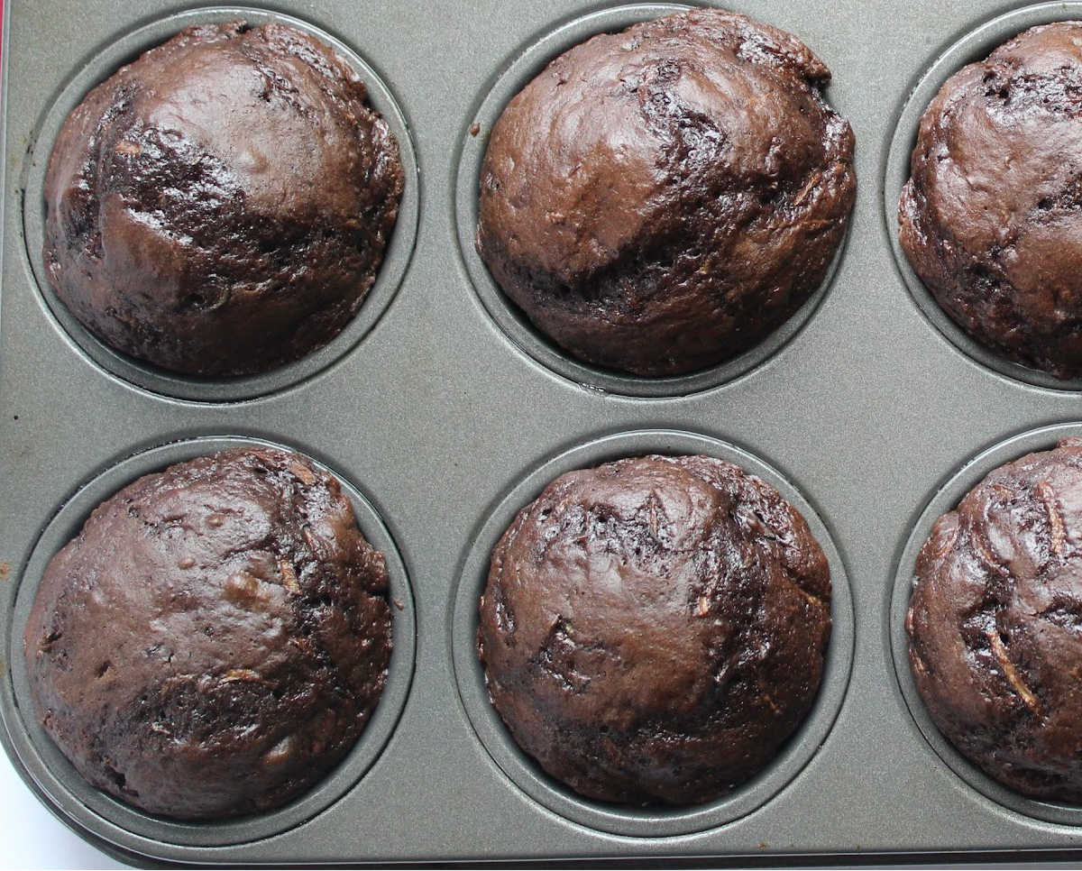 Chocolate muffins in a muffin tin.