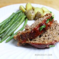 meatloaf served with green beans and mini potato