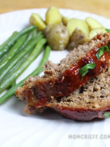 meatloaf served with green beans and mini potato