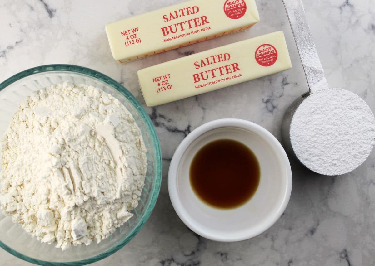 two sticks of butter, ½ cut icing sugar, 2 cups flour and vanilla extract