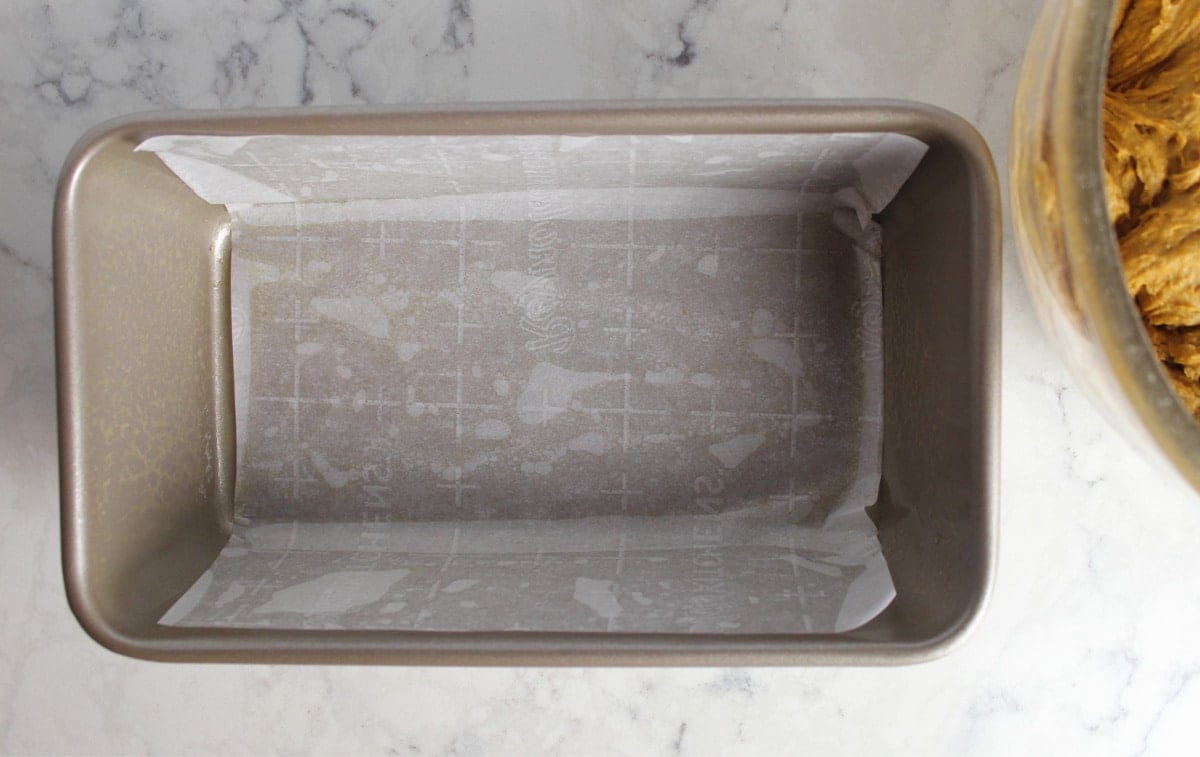 bread pan lined with parchment paper.