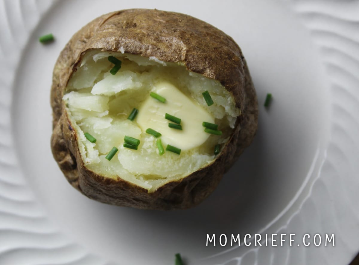 baked potato with butter and chives