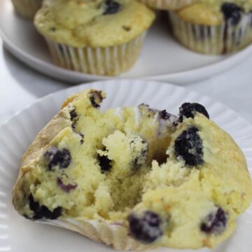 three ingredient blueberry muffin split open to see inside of the blueberry muffin.