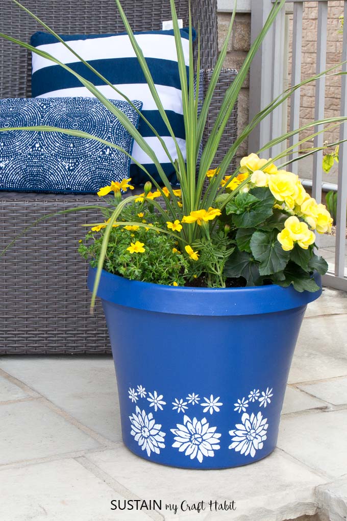 stenciled flower pot with flowers