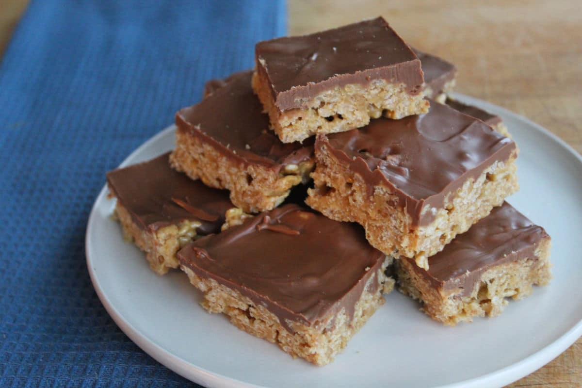 Special K bars stacked on a white plate.