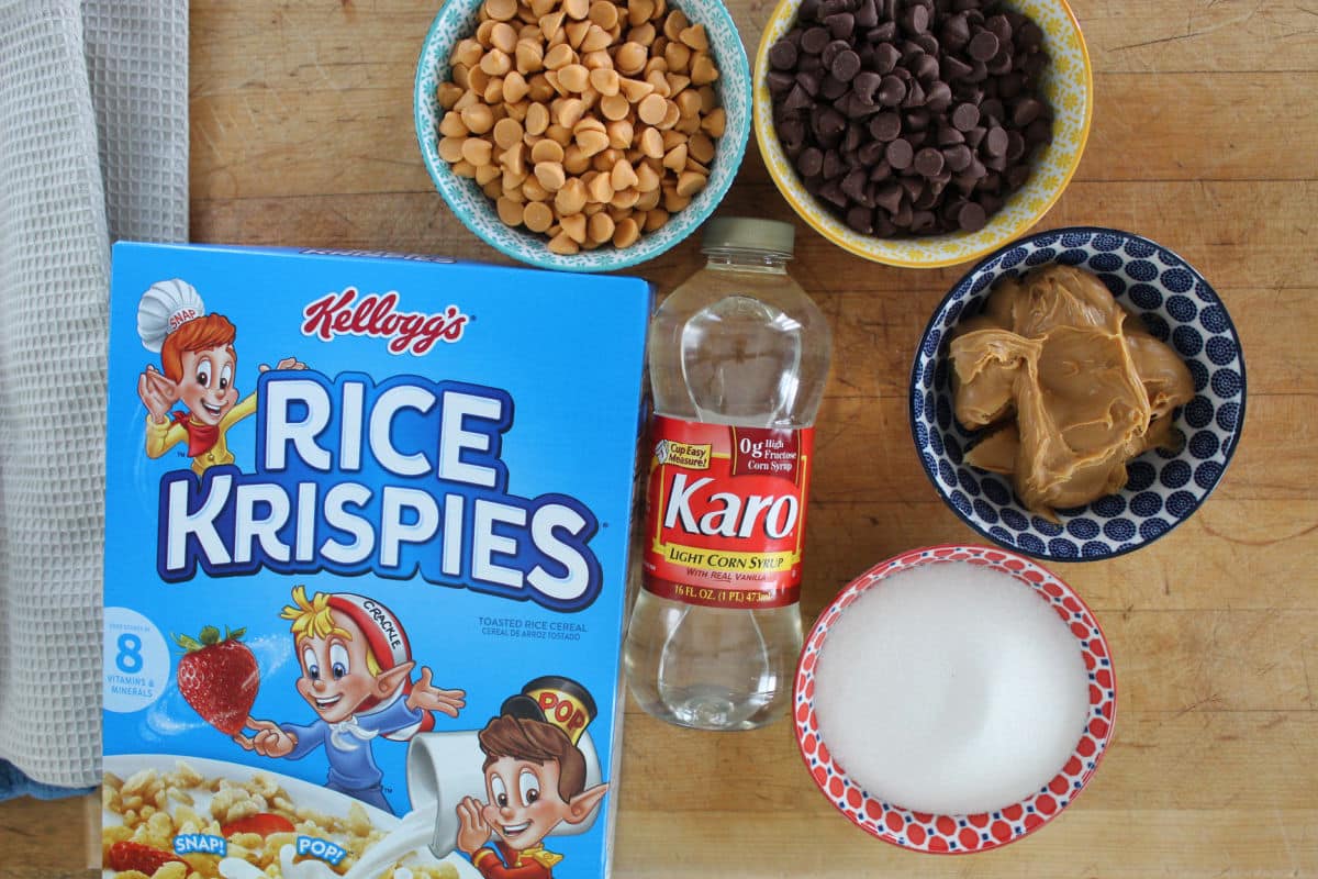 Scotcheroo cereal bar ingredients including chocolate and butterscotch chips, rice Krispies, corn syrup, sugar and peanut butter.