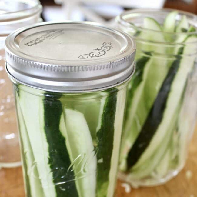 cucumber spears in a jar to make refrigerator pickles