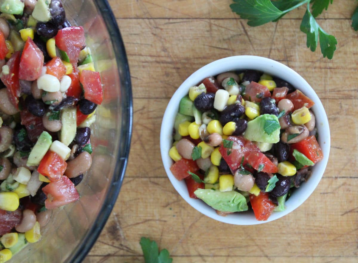 smaller serving of cowboy caviar in a small white bowl.