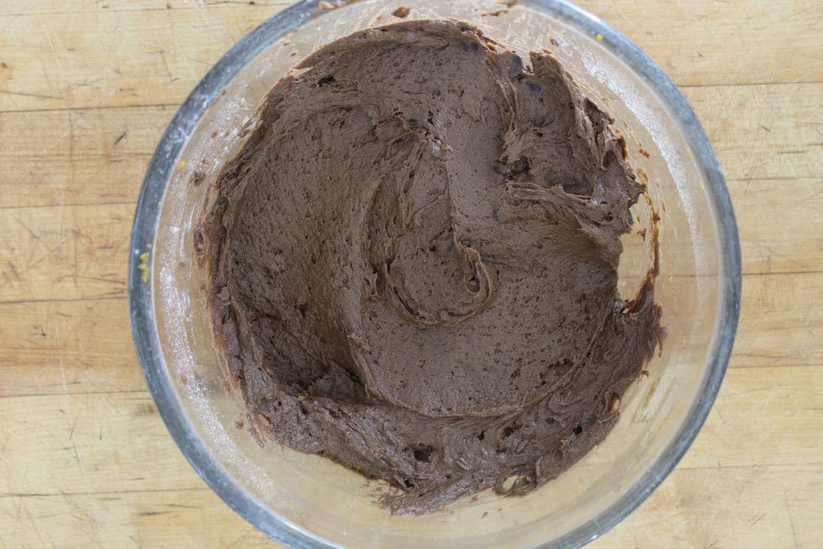 Mixed chocolate muffin batter in clear bowl