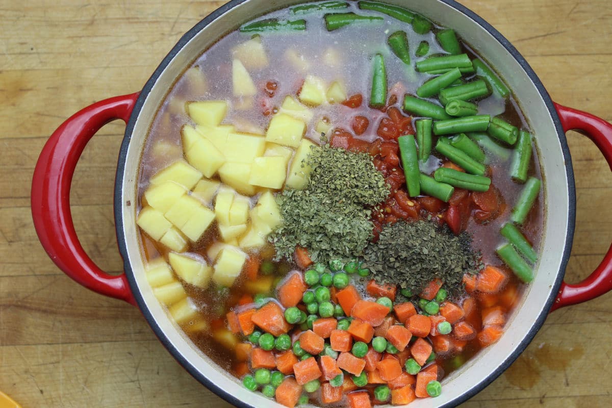 All ingredients added to pot for hamburger soup.