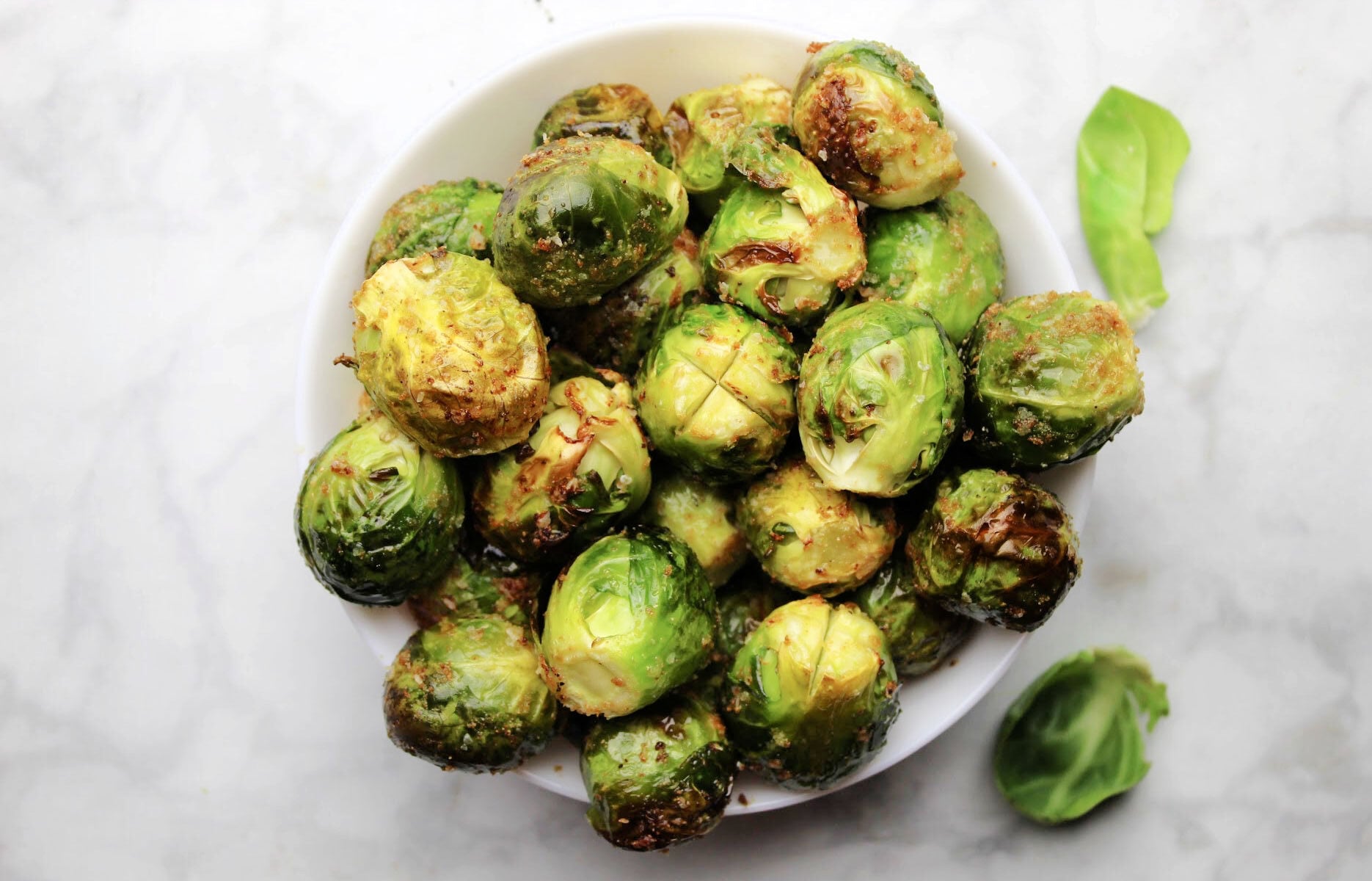 crispy Brussels Sprouts in a white bowl