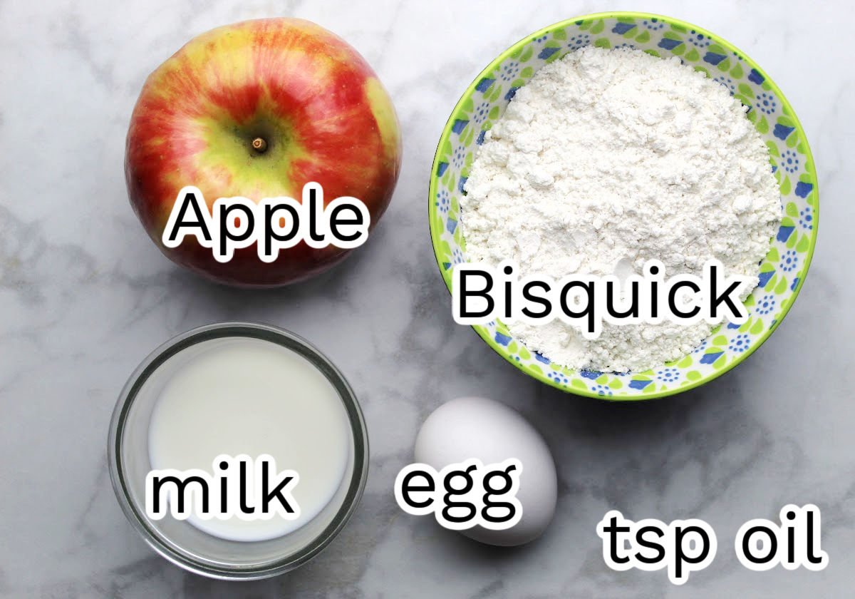 Apple ring pancake ingredients which include an apple, Bisquick, milk, egg and oil.